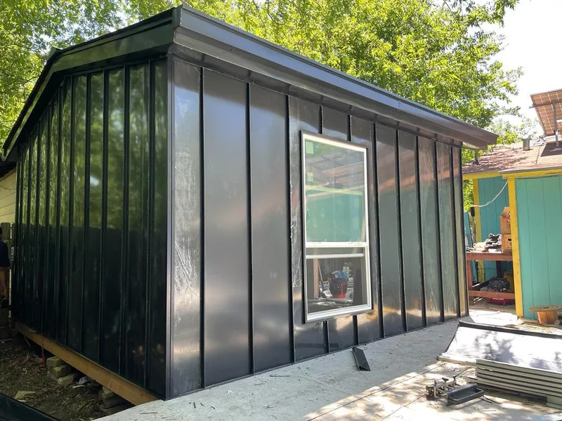 Black standing seam metal wall panels for Metal Roof Installation in Elsmere